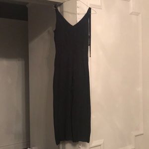 3/4 Black Wide legged Jumpsuit. Runs small.